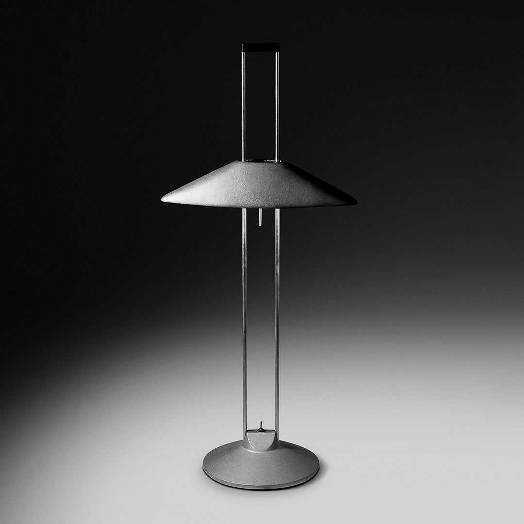 Adjustable metal table lamp in raw finish