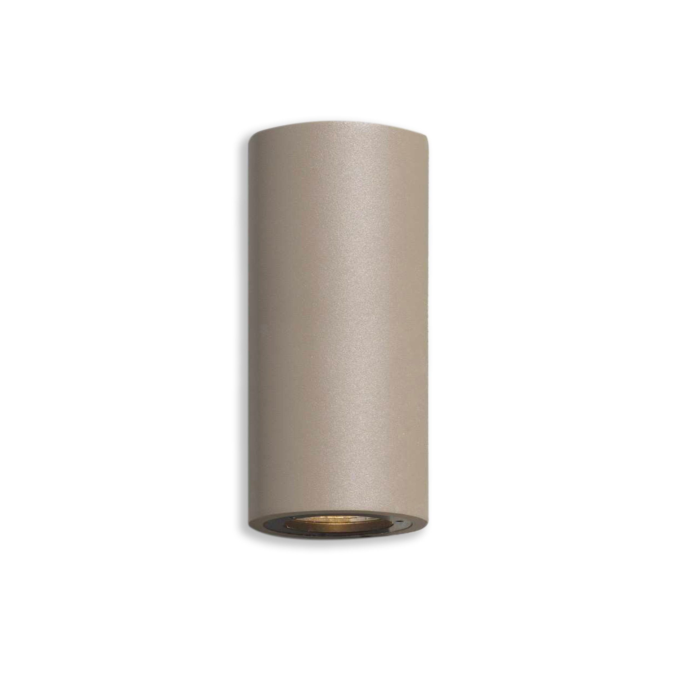 Cylindrical mud brown light fixture on a white background