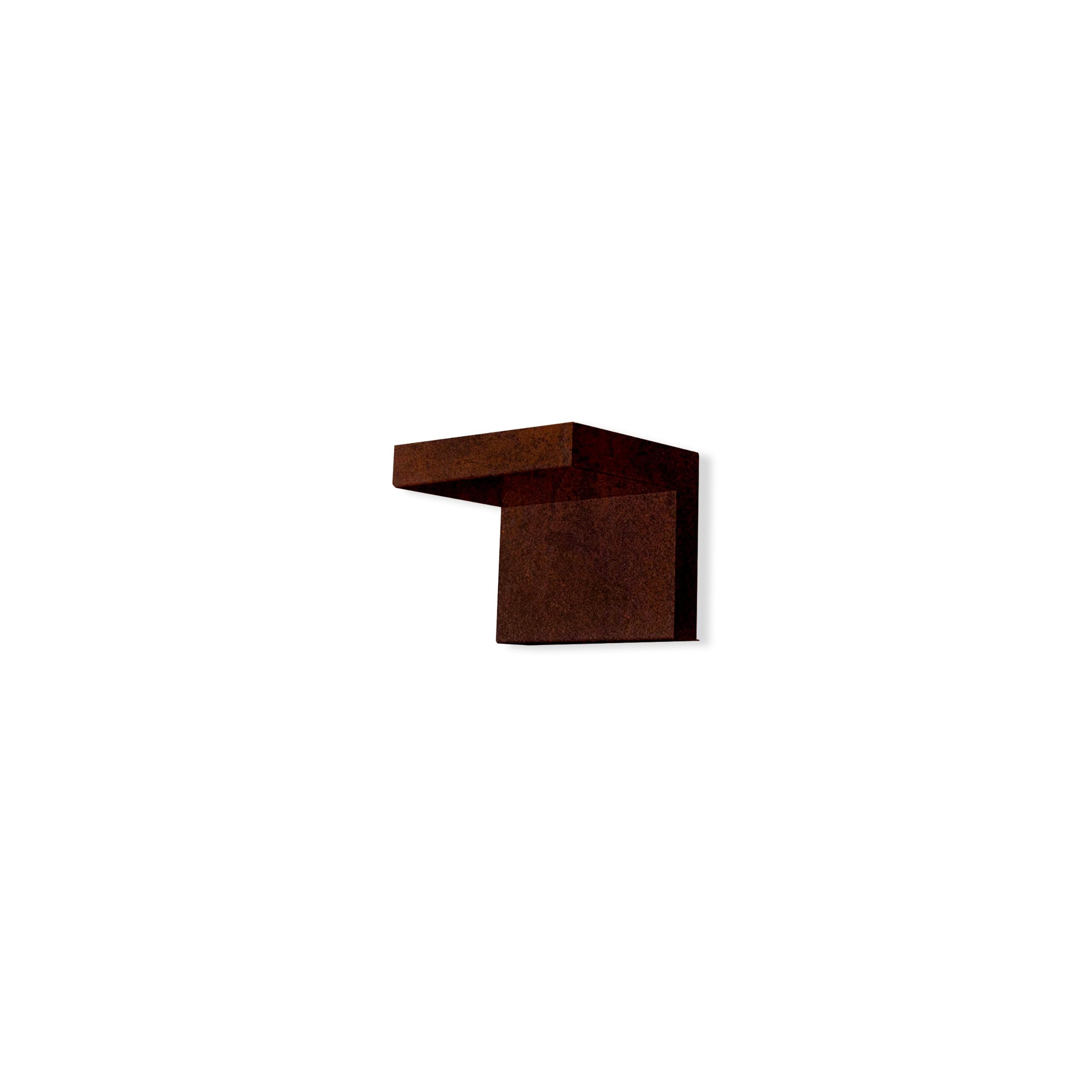 Wall light in corten finish on a white background
