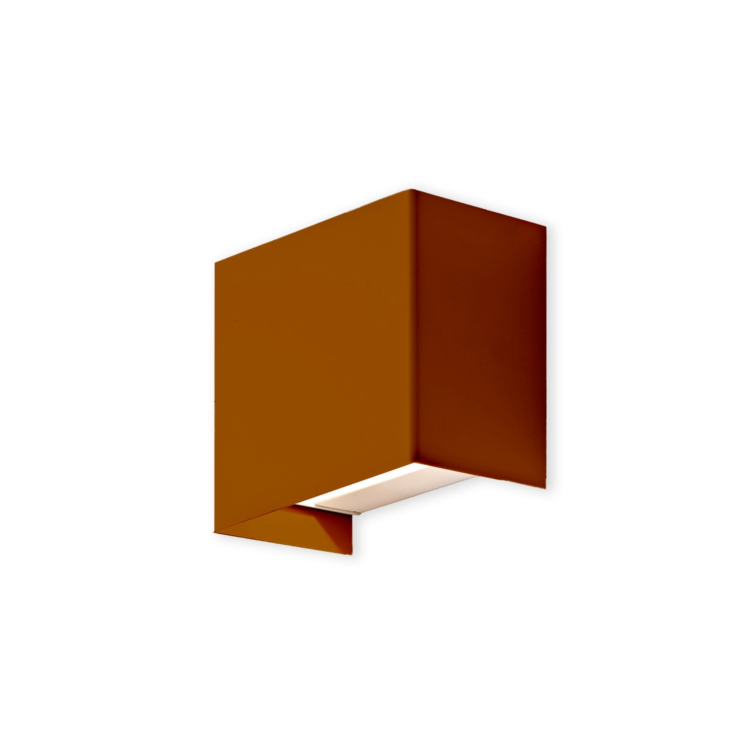 Brick Red wall-mounted light fixture on a white background