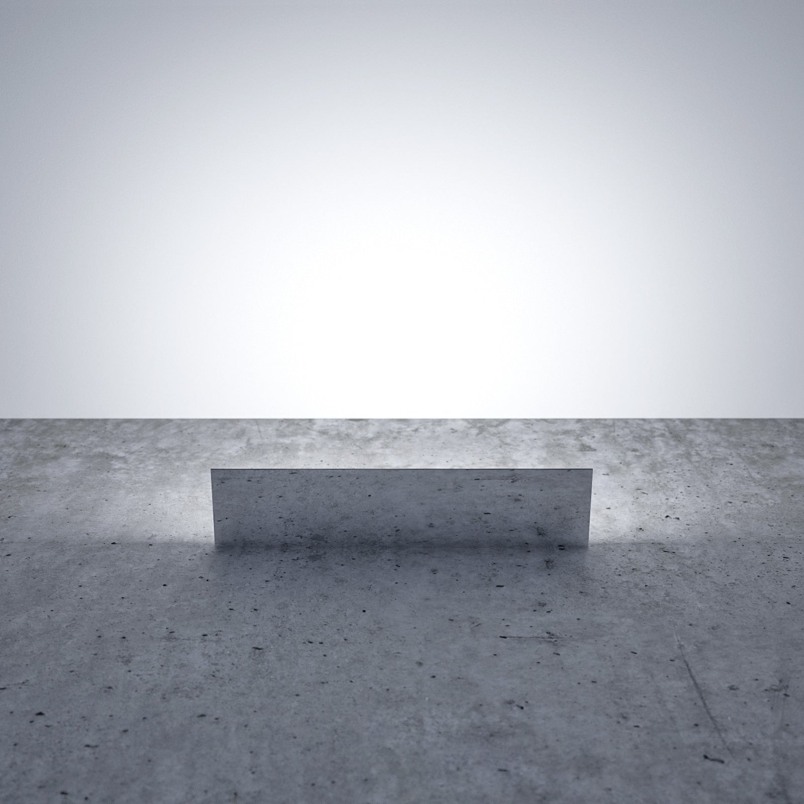 Mirror finished LED wall light on concrete wall
