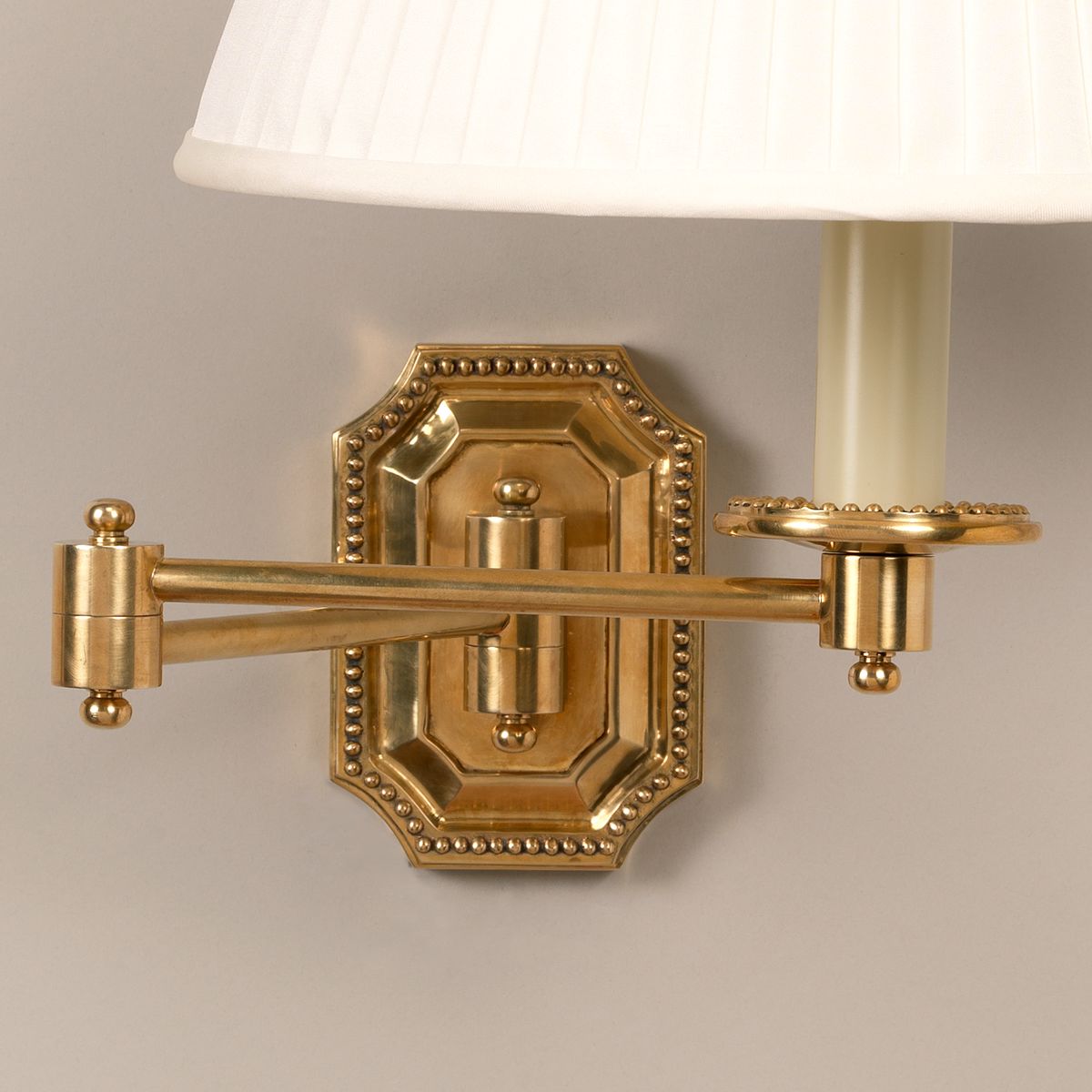 Billington Swing Arm Wall Light - Polished Brass with Cream Shade Detail