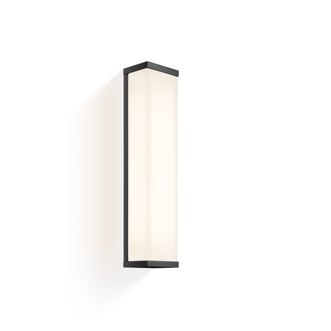 A tall rectangular chrome bathroom wall light that emits a warm white light, designed in a modern style with a sleek finish.