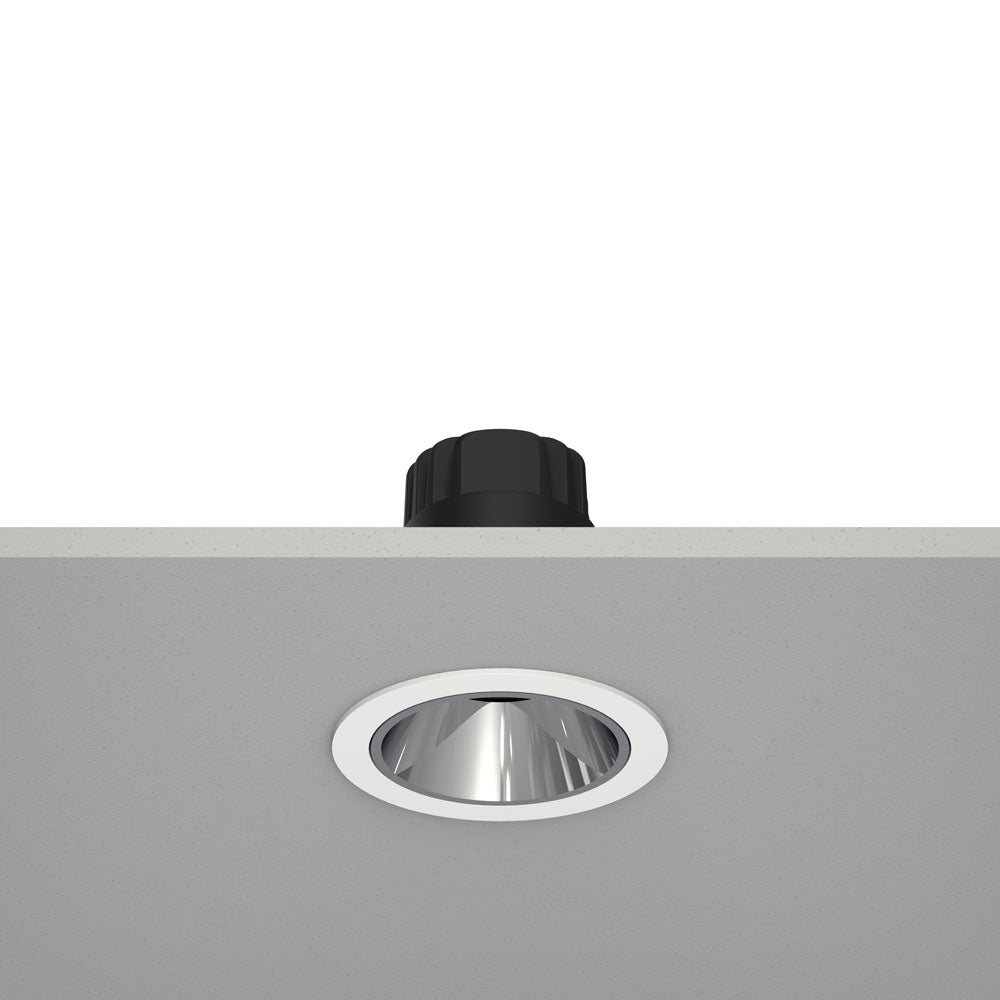 Ceiling light fixture with black housing and silver reflector on a white background