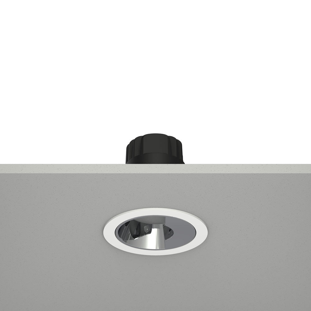 Ceiling light fixture with black housing and white trim on a gray background