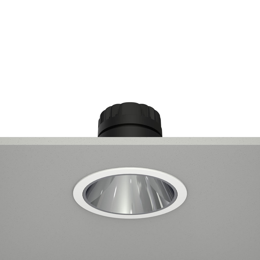 Ceiling-mounted light fixture with black housing and silver interior on a white background